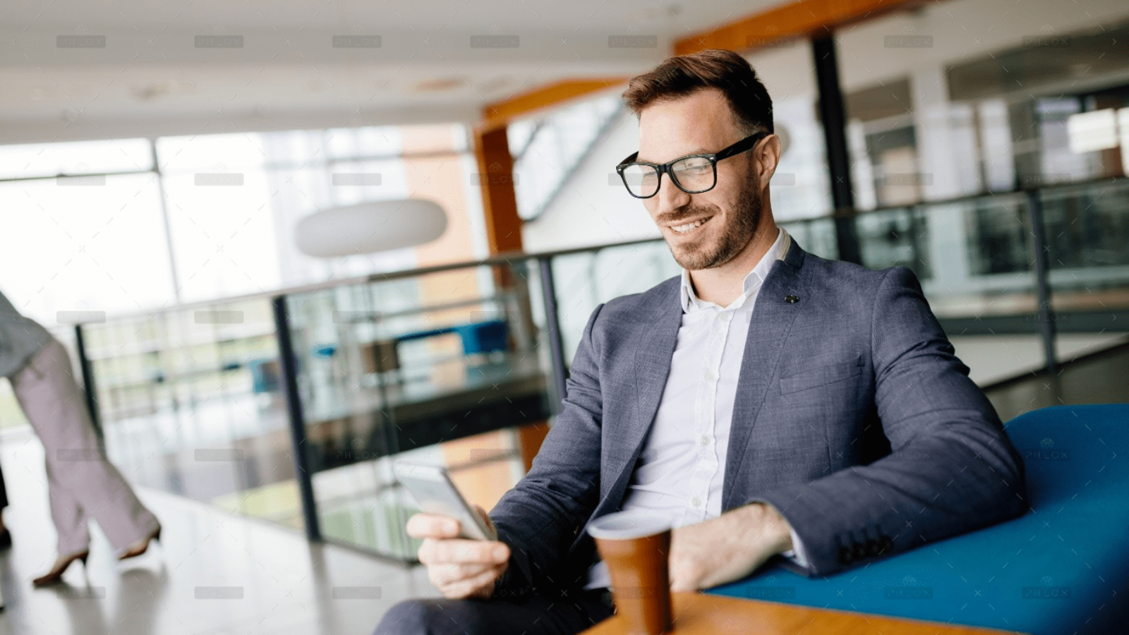 demo-attachment-46-businessman-taking-a-break-with-a-cup-of-coffee-JW4B3DH